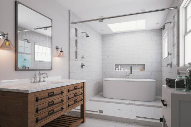 A remodeled bathroom featuring a spacious tub and a modern sink, showcasing contemporary design elements.