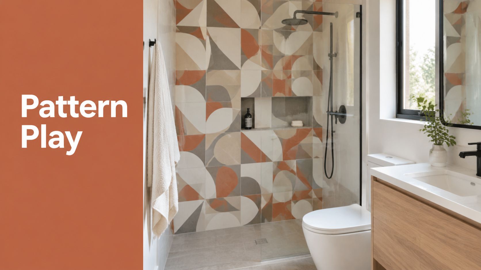 A modern bathroom interior featuring patterned geometric tiles, a glass shower enclosure, and a wood vanity cabinet.